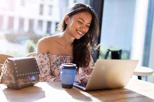 Filipino woman with lap top