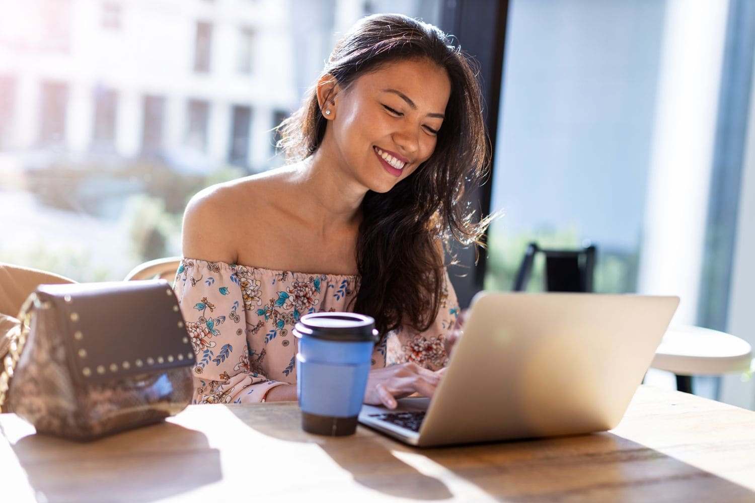 Filipino woman with lap top